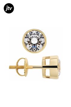 Bella Luce�� white diamond simulant 2.00ctw round, 14k yellow gold studs with velvet gift box. Meaures approximately 0.19" L x 0.19" W and has screwback backings. The diamond equivalent weight is 1.21ctw. Gold Diamond Earrings With Tension Setting For Anniversary, Gift Round Diamond Earrings With Tension Setting, Gold Diamond Earrings With Tension Setting, Classic Gold Diamond Earrings With Tension Setting, Gold Diamond Earrings With Tension Setting For Formal Occasions, Formal Gold Diamond Earrings With Tension Setting, Diamond Simulant, Gold Studs, White Diamond