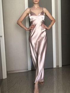 This silk satin slip dress can be worn as a bridesmaid dress, party and date dress and for many other occasions. Made of satin silk. DESCRİPTİON: -Adjustable straps. -Designed for a slim but relaxed fit. -Unlined. İt is a custom made dress, tailored according to your preferences, you can choose the length of the dress and order it with cut on the front. While ordering write your bust, waist and hips measure, so the dress will be made to your size. Please enquire if you're interested in different Luxury Silk Modal Satin Dress For Women, Elegant Pink V-neck Slip Dress, Silk V-neck Slip Dress For Prom, Pink Satin Evening Dress With Spaghetti Straps, Pink Silk Slip Dress With Bias Cut, Feminine Modal Satin Wedding Dress, Pink Silk Party Dress With Bias Cut, Pink Elegant Silk Satin Dress, Feminine Satin Dress For Wedding Night