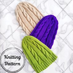 three knitted hats sitting next to each other on top of a white surface with the words knitting pattern below it