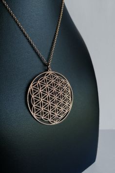 Flower of life necklace, sacred geometry. Mandala necklace. Flower of life. It is believed that the flower of life represents the cycle of creation. It describes how all life comes from a single source. In fact, looking carefully at this symbol, you can see how all the geometric shapes can be found within it. The flower of life therefore symbolizes creation and reminds us of the unity of everything: everything is built starting from the same project. The flower of life is a fascinating and ancie Spiritual Medallion Filigree Necklace, Spiritual Medallion Necklace With Filigree, Spiritual Filigree Medallion Necklace, Spiritual Medallion Necklace With Filigree Details, Spiritual Filigree Flower Pendant Necklace, Spiritual Round Pendant Necklace With Filigree, Spiritual Round Filigree Necklace, Spiritual Rose Gold Locket Necklace, Spiritual Rose Gold Pendant Necklaces