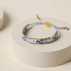 Add personality and color to any outfit with this hand beaded bracelet crafted by fair trade female artisans in Indonesia. Unique Macrame Bracelets, Body Oil Perfume, Unique Macrame, Heart Disc, Golden Key, Womens Hats, Silk Necklace, Fabric Bracelets, Chevron Necklace