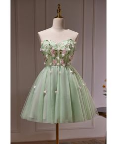 Get 10% off now! Buy fairytale dusty green tulle strapless short prom dress with flowers at cheap price online. Free stable shipping and pro custom service since 2009. Light Green Tulle Dress, Chotronette Dresses Short, Tiana Green Quinceanera Dresses, Short Green Fairy Dress, Enchanted Forest Dresses Homecoming, Flower Themed Dress, Homecoming Dresses Sage Green, Homecoming Fits, Prom Dress With Flowers