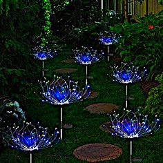 lighted garden stakers in the shape of flowers