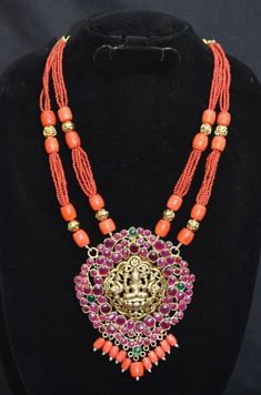 Luxurious laxmi Temple pendent with real coral mala.product-temple jewellery pendentfinish-antiquebeads-coral(munga,pagdam) Traditional Coral Necklace With Gemstone Beads, Traditional Coral Gemstone Beads, Temple Jewelry Beaded Necklaces For Festivals, Temple Necklace With Locket For Festivals, Temple Jewelry Beaded Necklaces For Puja Festivals, Traditional Orange Necklaces For Festivals, Traditional Red Mala For Festivals, Temple Necklace With Round Beads For Rituals, Temple Jewelry Mala With Gemstone Beads