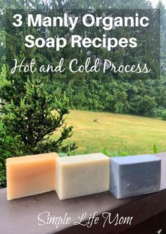 three soap bars sitting on top of a window sill with trees in the background