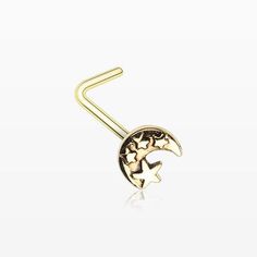 a gold nose ring with the moon and stars on it