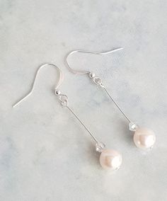 A pair of dainty dangle earrings made to order with 8mm preciosa glass pearls,   4 bicone crystals giving a beautiful sparkle to the earrings The length of the earrings is approx 5.5cm You can personalise the earrings with a choice of different coloured pearls and a choice of hooks, clip ons or studs earring fastening in gold, silver or rose gold plated  Comes with a pretty organza gift bag The colour of the actual earrings might be slightly different to the photo due to the lighting All measure Elegant Sterling Silver Crystal Earrings With Round Beads, Classic Pearl Drop Crystal Earrings For Gift, Elegant Round Beads Crystal Earrings For Wedding, Elegant Beaded Crystal Earrings For Wedding, Diy Wire Jewelry, Summer Necklace, Lovely Earrings, Single Earring, Pearl Pendant