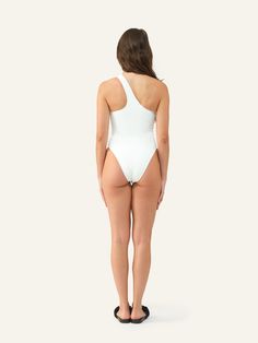 Meet Margot. With its striking asymmetrical neckline and high-cut leg silhouette, this one-piece swimsuit makes a bold statement. Stretch One Shoulder Bodysuit For Beachwear, Stretch One-shoulder Beachwear Bodysuit, Stretch One-shoulder Bodysuit For Beachwear, One-shoulder Bodysuit With Lined Body, Stretch Bodysuit With Asymmetrical Neckline And Lined Body, One-shoulder Beachwear Bodysuit For Poolside, Fitted Bodysuit With Asymmetrical Neckline And Lined Body, Chic One-shoulder Bodysuit For Poolside, One Shoulder Stretch Bodysuit For Pool