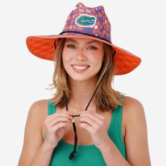 Camping trips. Beach days. Gamedays. Keep the sun out of your eyes and your team spirit on your head with the Florida Gators Thematic Straw Hat. Features All-over team-colored design so you can rep the team in style Thematic, team-specific pattern that will look great with the rest of your team apparel Sturdy straw construction that makes this a fit for your summer style Embroidered team logo display, in case there were any doubts where your allegiances lie Black lace chin string for a comfortab Adjustable Team Spirit Hat For Fan Gear, Adjustable Hats For Team Spirit, Casual Sports Hat With Uv Protection, Casual Hats With Uv Protection For Sports Events, Adjustable Collegiate Hats For Outdoor, Adjustable Hats For Fan Merchandise With Team Spirit, Adjustable Fan Merchandise Hat, Fun Multicolor Sports Hat, Adjustable Sports Fan Hat For Fan Merchandise