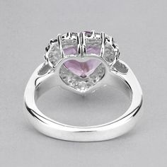 "Amethyst Ring, Halo Amethyst Heart Silver Ring, Natural Amethyst Ring for Women, February Birthstone Ring Flaunt yourself with this amethyst & white topaz halo ring. The natural gemstones have a combined weight of 3.53 carats and are set in .925 sterling silver with rhodium plating. The purple hue of this ring adds a pop of color to any look! The understated design and vibrant stones make this ring perfect for every occasion. amethyst halo silver ring, amethyst ring, amethyst silver ring, n Heart Cut Amethyst Jewelry With Center Stone, Heart Cut Amethyst Ring With Accent Stones, Valentine's Day Purple Amethyst Promise Ring, Amethyst Heart Cut Ring For Anniversary, Fine Jewelry Amethyst Ring Heart Cut, Purple Amethyst Birthstone Ring For Valentine's Day, Fine Jewelry Heart Cut Amethyst Ring, Purple Amethyst Heart Cut Ring For Valentine's Day, Purple Heart Amethyst Ring With Accent Stones