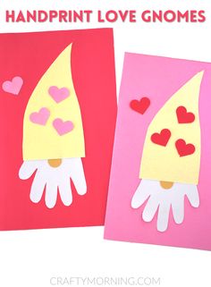 two handprinted valentine's day cards with paper hearts on them, one is holding