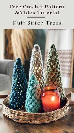 crochet christmas trees in a basket on a table with text overlay that reads free crochet pattern and video tutor