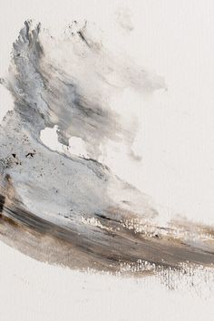 an abstract painting with white and brown colors