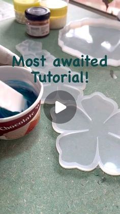 the video shows how to make flower shaped paper plates with acrylic paint and stencils