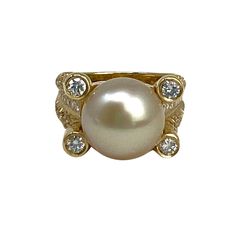 Tishman & Lipp 18K Gold Ring with 106 Diamonds and Golden Pearl (includes appraisal, Value: $5,790) Designer = Tishman & Lipp Size = 6.5 Material = 18K Gold Gemstone = Diamond/Pearl Condition = Excellent Class = Premier Location: Wilmette Item Number: 11405-1452 Item ID: 299089 Category: Ring Luxury Gold Pearl Ring With High Luster, Luxury High Luster Pearl Ring For Formal Occasions, Luxury High Luster Gold Pearl Ring, Luxury 14k Gold Pearl Ring, Luxury Yellow Gold Pearl Ring With Polished Finish, Luxury Gold Pearl Ring, Luxury Yellow Gold Pearl Ring Hallmarked, Luxury Gold Rings With High Luster, Luxury High Luster Gold Rings