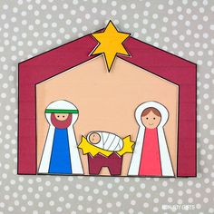 paper cut out of a nativity scene with the baby jesus and three wise men