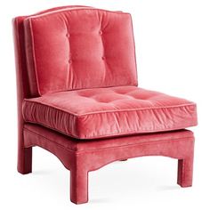 an upholstered red chair on white background