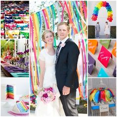 a couple standing next to each other in front of rainbow colored decorations and paper streamers