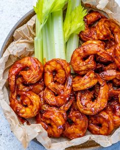 bbq shrimp with celery on the side and text overlay that reads 15 minutes barbecue shrimp