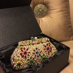 Indulge In This Beauty. Presenting A One Of A Kind Show-Stopper! Evening Bag Adorned With A Multitude Of Jeweled Colored Stones To Make You Say Wow!! Measures 7"X 3-1/2" X 2". Shiny Gold Interior With A Removable Gold Chain To Be Worn Either As A Clutch Or Shoulder Bag. Two Beautifully Adorned Snap Closure "Buttons" (For Lack Of A Better Word). These Pictures Cannot Capture The Brilliance And Sparkle Of This Bag! This Is Eye Candy! Truly A Masterpiece! Impeccable! Elegant Multicolor Evening Bag, Elegant Multicolor Clutch For Formal Occasions, Glamorous Multicolor Evening Bag For Formal Occasions, Elegant Multicolor Evening Bag For Formal Occasions, Elegant Multicolor Formal Bags, Luxury Multicolor Bags For Events, Glamorous Multicolor Bags For Formal Occasions, Luxury Multicolor Event Bags, Luxury Multicolor Evening Bag For Wedding