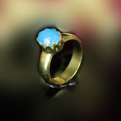 Blue Quartz Gemstone Ring- Unisex Ring- Gold Plated Brass- Ethnic Ring- Quartz Jewelry- Blue Ring- Victorian Ring- Engagement Gifts D E S C R I P T I O N : Metal : Brass Plating : Gold Plated Gemstone : Blue Quartz Weight : 3.33 Gram Approx Stone Size : 8 X 6 MM Approx ❣❣ Handmade Item ❣❣ **Made to Order** » G EM S T O N E D E T A I L « **Gemstone structure may vary from the image as two gemstones do not have the same structure** If you want to see the picture of gemstone, then feel free to cont Blue Bohemian Moonstone Ring, Blue Moonstone Ring With Natural Stones In Bohemian Style, Blue Moonstone Ring With Natural Stones Bohemian Style, Bohemian Blue Moonstone Ring With Natural Stones, Blue Bohemian Moonstone Ring With Natural Stones, Blue Wedding Rings With Natural Stones, Wedding Blue Rings With Natural Stones, Bohemian Blue Crystal Ring For Gift, Blue Round Bohemian Crystal Ring