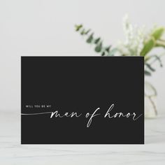 a card that says, will you be my man of honor? with flowers in the background