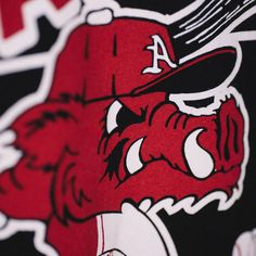 The Arkansas baseball program has a storied reputation, with over 20 championships, including the 2021 conference championship, where they defeated Tennessee, 7-2. Show your allegiance to the Diamond Hogs with this vintage 1980s Razorback! Brought to you in partnership with College Vault. Products are mocked up on a size S. Graphics may appear smaller on larger sizes. Collegiate Baseball Jersey With Graphic Print, Collegiate Team-colored Baseball Jersey With Graphic Print, Collegiate Cotton Baseball Jersey For Fans, Cotton Baseball Jersey For Fans, Sporty Baseball Jersey With Graphic Print For Fans, Collegiate Baseball Jersey Fan Merchandise, Collegiate Style Baseball Jersey For Sports Season, Game Day Baseball Jersey With Graphic Print, Varsity Style Cotton Baseball Jersey For Fans