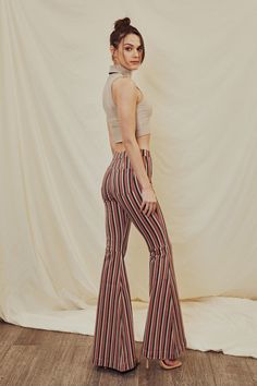 Get wild with our Jaqueline High Rise Super Flare Jeans set in a unique burgundy striped design. Includes back dart detailing to give the perfect fit and lift while ensuring comfort from our stretch denim. Featuring a cut seam at the back of the knee, wide hem, classic front button closure, and zip fly. Rise 11" / Inseam 34" (In size 3/25) 76% Cotton, 5% Polyester, 2% Spandex Model in Size 25 Style # : KC5246BG Stretchiness Level >> Stretch SIZE WAIST HIP 1 / 24 25.5" 32.5" 3 / 25 26.5" 33.5" 5 Super Flare Jeans, Stripes Design, Flare Jeans, Stretch Denim, The Knee, High Rise, Perfect Fit, Pants, Clothes