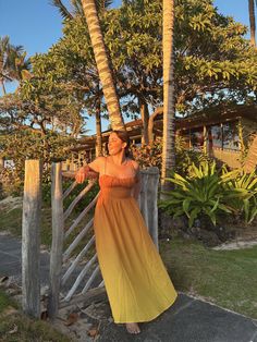 The perfect vacation dress does exist - meet our Wailea Sunset Ombre Maxi Dress! Available in orange and pink, this dramatic ankle-sweeping maxi dress features gorgeous ombre fabric that fades from rich burnt orange to butter yellow, adjustable spaghetti straps and an empire waist. We're pairing with a dramatic gold earring and low bun for your best vacation look yet. 65% Cotton 35% Polyester Gradient Color Summer Midi Dress, Ombre Midi-length Summer Dress, Summer Bohemian Ombre Dresses, Orange Spaghetti Strap Summer Maxi Dress, Ombre Sleeveless Beach Dress, Ombre Sleeveless Dress For Beach, Yellow Spaghetti Strap Maxi Dress For Beach Season, Sleeveless Ombre Beach Dress, Sleeveless Gradient Maxi Dress For Summer