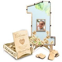 a wooden photo frame with hearts on it