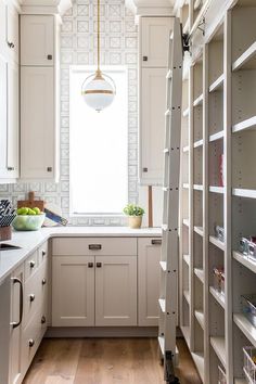 the kitchen is clean and ready to be used as a storage area for food items