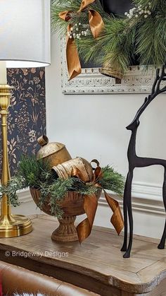 christmas decorations on a table in a living room