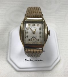 "PLEASE READ ENTIRE DESCRIPTION BEFORE PURCHASING For Sale: (1) Vintage Original Benrus Swiss 15 Jewels 10k Rolled Gold Mechanical Wrist Watch Please see pictures for more details! Pre-owned: Some scratches from normal wear. Face shows some discoloration. Please see photos for details. Watch is working and keeping time well. Watch is in great mechanical condition, all of our watches are tested for time by one of our watchmakers before being listed for sale. Bracelet could use some polishing. Spe Vintage Gold Watch Swisswatchexpo, Men's Watches, Square Watch, Saint Louis, Wrist Watches, Leather Band, Wrist Watch, Brown Leather, Jewelry Watches