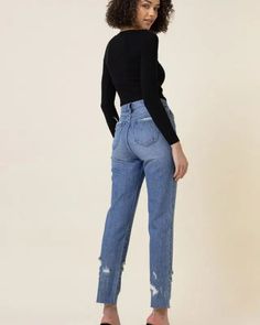 The High Waisted Straight Leg Jeans offer a flattering and versatile option for your denim collection. These slim straight fit ankle jeans provide a chic and streamlined silhouette that complements various outfits. The bottom part distress adds a trendy touch, giving these jeans a stylish and slightly rugged appearance. With classic 5-pocket construction and subtle distress on the back pockets, they strike a balance between classic and modern denim style. The zip-fly closure ensures easy wear. - Ripped Fitted Cropped Jeans For Fall, Fall Ripped Fitted Cropped Jeans, Fall Fitted Ripped Cropped Jeans, Trendy Tapered Leg Cropped Jeans For Fall, Trendy Fall Cropped Tapered Leg Jeans, High Waist Ripped Cropped Jeans For Fall, Chic Non-stretch Jeans With Frayed Hem, Chic Medium Wash Straight Leg Cropped Jeans, Chic Straight Leg Cropped Jeans In Medium Wash