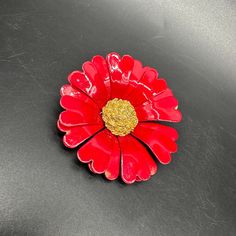 Vintage Flower Brooch Pin Enamel Metal Red Floral Statement Jewelry Retro. This is a large red flower brooch. It is metal with enamel over the top and makes quite the statement. It does have some chips and dings to the enamel throughout. Please see the picture for the full description. Red Enamel Brooch, Red Enamel Brooch Pin, Pin Enamel, Red Flower, Enamel Jewelry, Flower Brooch, Red Floral, Red Flowers, Vintage Flowers