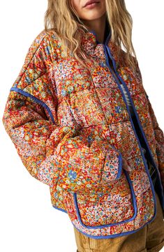 A quilted, boho-inspired jacket features a slouchy silhouette with a vibrant floral print and defined piping for a unique cold-weather look. 23 1/2" length (size Medium) Front hook-and-eye closure Stand collar Drop-in pockets Lined, with polyester fill 100% cotton Dry clean or machine wash, tumble dry Imported Quilt Coats, Floral Print Jacket, Quilt Jacket, Jacket Outfit, Quilted Coat, Collar Designs, Jacket Pattern, Print Jacket