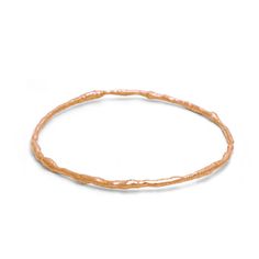 An uncluttered beauty that seems almost primal. Liberated from fuss, our Old Money Bangles focus on form with a seductive texture that lures you in. Offered here in 18k rose gold. This listing is for one 18k Rose Gold Bangle Inside bangle diameter measurement: roughly 2 3/8" To determine the best fit, please measure the inside diameter of one of your favorite narrow bangles by laying a ruler laying over top. The diameter needs to go over the widest part of your hand For additional sizes, please Elegant Hammered Rose Gold Bracelets, Money Collection, Rose Gold Bangle, Gold Bangle, Gold Hoop, Gold Bangles, Designer Earrings, 18k Rose Gold, Everyday Style