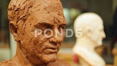 Hand of sculptor finishing a clay head eye in an art studio Stock Footage #AD ,#clay#head#Hand#finishing