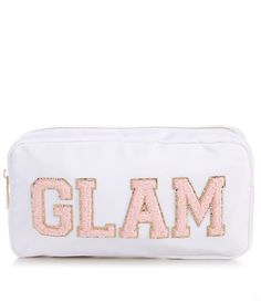 From GB&#x2C; this bag features:Solid bodyPatch sewn on "GLAM" letteringZip closureDimensions approx. 9.5" x 5" x 2"NylonImported. Everyday Nylon Bags With Embroidered Logo, Nylon Bag With Embroidered Logo For Everyday Use, White Nylon Bags With Zipper Closure, White Nylon Bag With Zipper Closure, Trendy Back-to-school Zipper Pouch Bag, Trendy School Cosmetic Bag With Zipper Pocket, White School Bags With Letter Embroidery, Trendy Zipper Pouch Bag For Back To School, Trendy Everyday Bag With Letter Patch