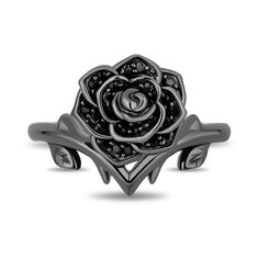 a black rose ring with diamonds on it