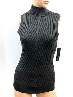 Apt 9 Women's Sweater Charcoal Black Mock Neck Size XS  70% Rayon, 30% Nylon All measurements are seam to seam Armpit to armpit 16" Length 24" Fitted Gray Vest Top, Gray Fitted High Neck Tops, Fitted Gray High Neck Tops, Fitted High Neck Gray Tops, Winter Ribbed Vest, Fitted Sweater Vest For Winter Layering, Fitted Sleeveless Sweater Vest Casual, Black Stretch Sweater Vest, Fitted Black Ribbed Vest