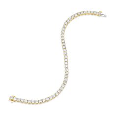 Named after tennis player Billie Jean King, this bracelet is a timeless addition to any fine jewelry collection. Each of the 48 round natural diamonds is hand selected and four prong set for a classic yet bold statement. Classic Everyday Luxury Tennis Bracelet With Pave Setting, Classic Gold Bracelet With Cubic Zirconia Round Cut, Classic Gold Bracelet With Cubic Zirconia, Classic Gold Bracelet With Brilliant Cut Cubic Zirconia, Classic Diamond White Gold Bracelet With Cubic Zirconia, Luxury Tennis Bracelet With Pave Setting, Luxury Round Cut Tennis Bracelet With Pave Setting, Classic Gold Bracelet With Cubic Zirconia In Diamond White, Classic Gold Bracelet With Round Cut Cubic Zirconia