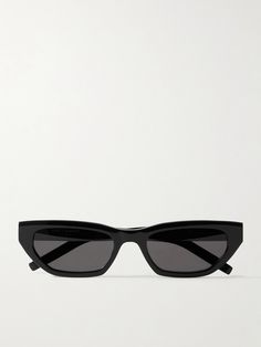 SAINT LAURENT Eyewear's retro-inspired cat-eye sunglasses are designed with sleek, angular frames. Made in Italy from black acetate, they have tonal lenses and silver-tone logos at the hinges. Womens Black Sunglasses, Ysl Shades, Anatomy Stickers, Expensive Sunglasses, Sunglasses Png, Pretty Sunglasses, Fancy Glasses, Ysl Sunglasses, Sunglasses Cat Eye