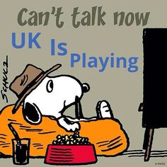 a cartoon dog eating food out of a bowl with the caption can't talk now uk is playing