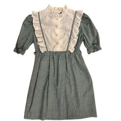 "Vintage 70's or 80's almost prairie style dress (also almost Dorothy!) by U.S. Dress White button front yoke with white ruffles and green & white gingham trim, ruffle neck Short puffed sleeves with elastic ruffle Full skirt  Belt loops but no belt, ribbon would work No fabric content, probably cotton or cotton blend No size tags, Please measure! Armpit to armpit  15\" (about 8-10) Shoulder to hem 27 1/4\" Free ship USA" Spring Prairie Dress With Ruffles And Short Sleeves, Fall Vintage Dress With Ruffles For Daywear, Pastoral Prairie Dress With Ruffles For Spring, Fall Vintage Dress With Ruffles For Daytime, Vintage Dresses For School In Spring, Fitted Vintage Dress With Ruffles In Pastoral Style, Fitted Prairie Dress With Ruffles For Fall, Fitted Pastoral Vintage Dress With Ruffles, Retro Ruffled Dresses For Fall