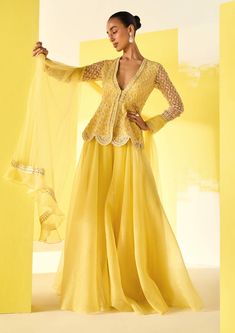 Ridhi Mehra-Aafeh Yellow Peplum Sharara Set-INDIASPOPUP.COM Maxi Dress Net Fabric, Embroidery Layout, Net Sharara, Sufi Night, Flared Sharara, Peplum Top Outfits, Haldi Dress, Ridhi Mehra, Sharara Designs