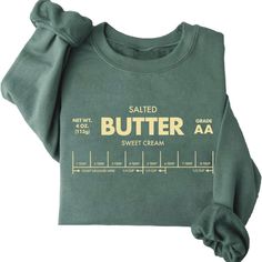 Every One Loves Butter! This Traditional Style Print Of Your Favorite Baking Stick Printed On Our Favorite Super Soft Pullover Is The Best Gift To Get Yourself Or Your Bestie For The Cozy Season Ahead!! Fitted Crew Neck Sweater With Letter Print, Fitted Fall Sweater With Letter Print, Fitted Green Cotton Sweatshirt, Cute Fitted Crew Neck Sweater, Fitted Cute Crew Neck Sweater, Fitted Crew Neck Sweater In Cute Style, Black Sweatshirt Women, Bright Sweater, Nike Crewneck Sweatshirt