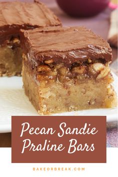 two pieces of pecan sandie pralie bars on a plate