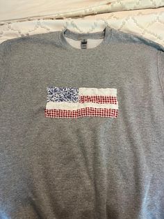 American Flag Sewn Hoodie | This sweatshirt comes with multiple, customizable colors and fabrics and is sewn by hand. Because each sweatshirt is handmade, no two sweatshirts are alike. American Flag, Hoodies Womens, Hand Sewing, Flag, Crew Neck, Sweatshirts Hoodie, Sewing, Sweatshirts, Clothes For Women