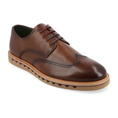 Introducing the Evander Derby shoe from Vance Co., a seamless fusion of style and comfort with its 1-inch heel, lace-up closure, and classic wingtip toe design. Crafted from faux leather this style offers a fashionable choice for various occasions. The mesh lining, 6 mm tru comfort foam footbed, and rubber outer sole ensure breathability, comfort, and support, making the Evander a versatile and conscious addition to your footwear collection.Features: ComfortClosure Type: Lace-UpFootwear Technolo Wingtip Oxford Lace-up Shoes With Textured Sole, Wingtip Oxfords With Removable Insole For Semi-formal Events, Business Lace-up Wingtip Shoes With Textured Sole, Semi-formal Wingtip Oxfords With Removable Insole, Lace-up Oxfords With Perforated Toe Box For Semi-formal Occasions, Semi-formal Lace-up Oxfords With Perforated Toe Box, Semi-formal Lace-up Shoes With Perforated Toe, Wingtip Oxfords With Textured Sole, Casual Semi-formal Wingtip Leather Shoes